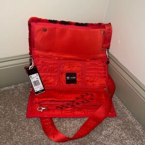 Ivy Park clutch cross body
New with tags